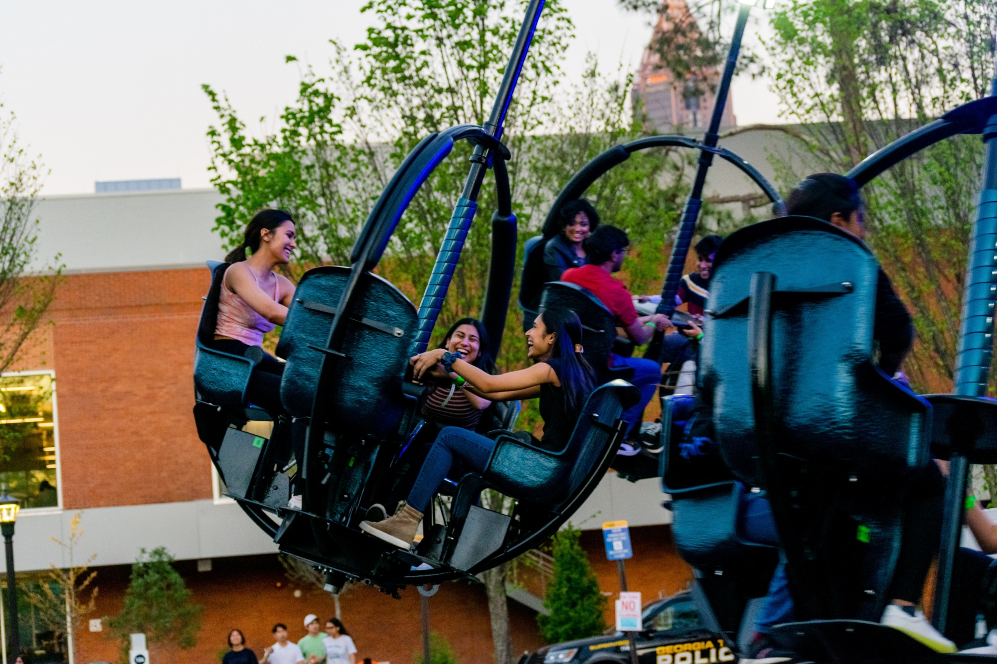 students on spinning ride
